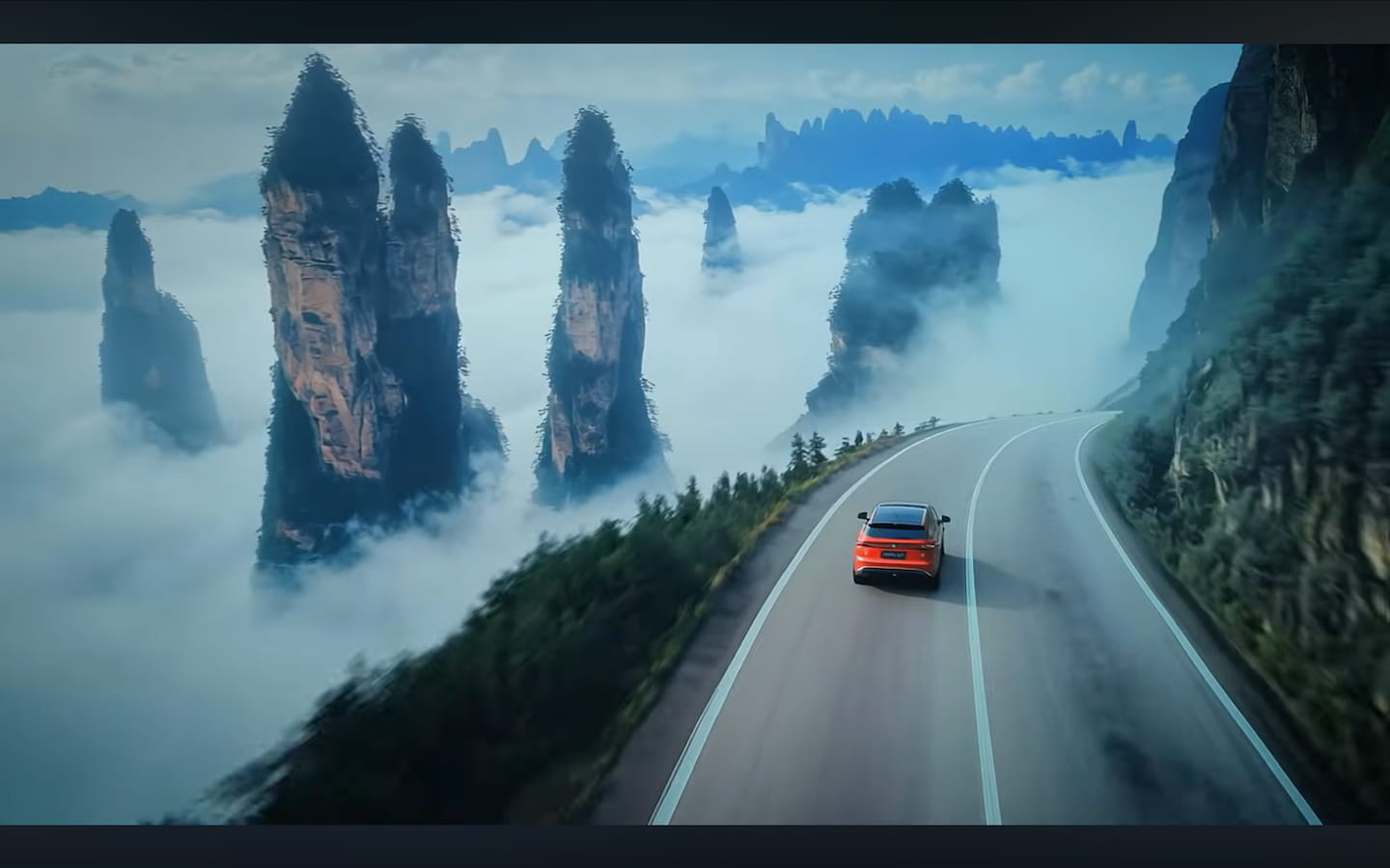 The mountain road, above the clouds.
