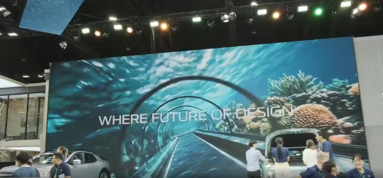 The film on the motor show wall.